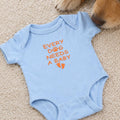 Every Dog Needs A Baby Embroidered Onesie